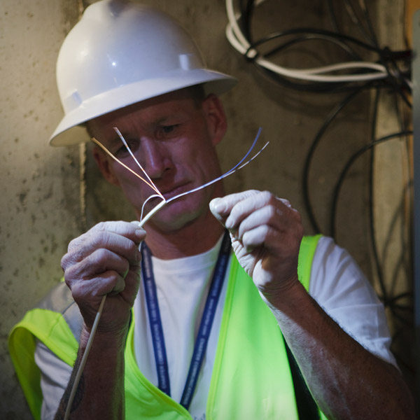 electricians working on wiring